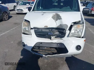 2013 Ford Transit Connect XLT z VIN NM0LS6BN7DT133925, wystawiony jako IAAI lot #41843878 z przebiegiem 120 425 mil mil oraz . Historia ofert i sprzedaży dostępna na DreamBid. Obrazek 6.