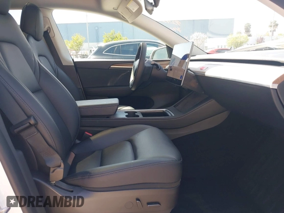 2023 Tesla Model Y Long Range with VIN 7SAYGDEE8PF612438, listed as a IAAI auction lot 41991145 with 29,775 mi miles and . Bid and sale history available at carsss.com. Image 5.