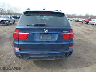 2011 BMW X5 35i with VIN 5UXZV4C56BL412415, listed as a IAAI auction lot 41611847 with 141,848 mi miles. Bid and sale history available at carsss.com. Image 16.