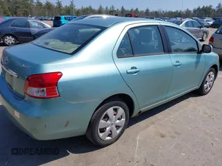 2008 Toyota Yaris with VIN JTDBT923484011003, listed as a IAAI auction lot 42107869 with 127,850 mi miles. Bid and sale history available at carsss.com. Image 4.