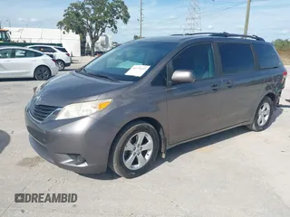 2014 Toyota Sienna LE AAS with VIN 5TDKK3DCXES432611, listed as a IAAI auction lot 40771635 with 214,145 mi miles and . Bid and sale history available at carsss.com. Image 18.