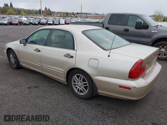 2000 Mitsubishi Diamante LS z VIN 6MMAP67P7YT005234, wystawiony jako IAAI lot #41896098 z przebiegiem 131 852 mil mil oraz . Historia ofert i sprzedaży dostępna na DreamBid. Obrazek 3.