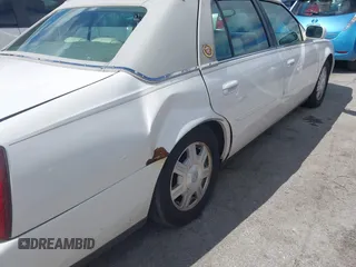 2003 Cadillac DeVille z VIN 1G6KD54Y23U221187, wystawiony jako IAAI lot #42339315 z przebiegiem 82 681 mil mil oraz . Historia ofert i sprzedaży dostępna na DreamBid. Obrazek 6.
