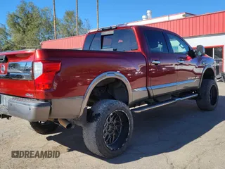 2017 Nissan Titan XD SL with VIN 1N6BA1F44HN548942, listed as a Copart auction lot 42217035 with 90,243 mi miles and Clean Title. Bid and sale history available at carsss.com. Image 4.