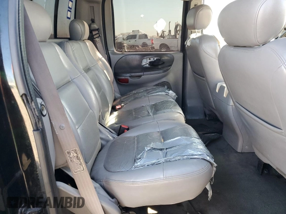 2003 Ford F-150 XLT with VIN 1FTRW07L73KA28876, listed as a Copart auction lot 49319565 with 290,880 mi miles and Salvage Title. Bid and sale history available at carsss.com. Image 10.
