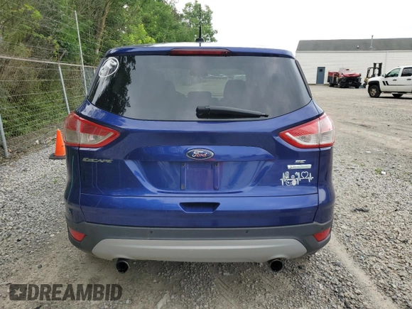 2013 Ford Escape SE with VIN 1FMCU0G97DUA95186, listed as a Copart auction lot 61862445 with 166,017 mi miles and Salvage title. Bid and sale history available at DreamBid. Image 6.