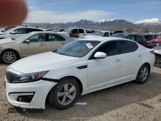 2015 Kia Optima LX with VIN 5XXGM4A74FG354536, listed as a Copart auction lot 52015025 with 26,191 mi miles and Salvage Title. Bid and sale history available at carsss.com. Image 1.