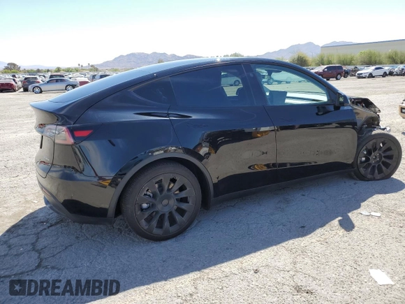 2024 Tesla Model Y Long Range z VIN 7SAYGAEE3RF089122, wystawiony jako Copart lot #52732035 z przebiegiem 15 486 mil mil oraz Szkoda całkowita • Salvage title. Historia ofert i sprzedaży dostępna na DreamBid. Obrazek 3.