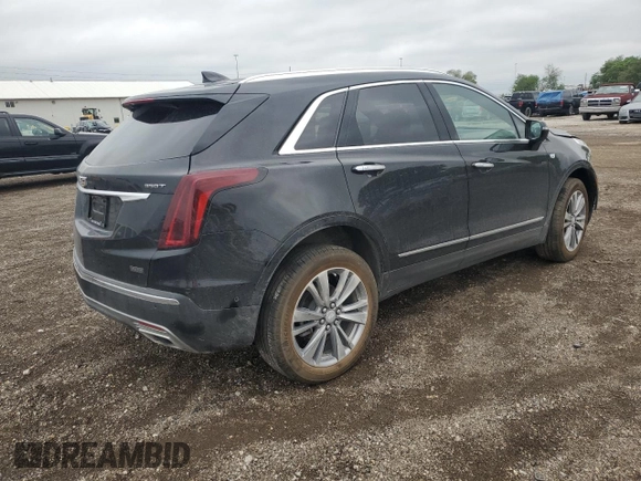 2023 Cadillac XT5 AWD Premium Luxury with VIN 1GYKNDR45PZ224937, listed as a Copart auction lot 57599125 with 12,905 mi miles and Salvage title. Bid and sale history available at DreamBid. Image 3.