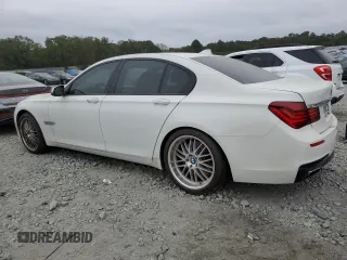 2015 BMW 7 Series 750i z VIN WBAYA8C5XFD825662, wystawiony jako Copart lot #78850474 z przebiegiem 153 080 mil mil oraz Czysty tytuł • Clean title. Historia ofert i sprzedaży dostępna na DreamBid. Obrazek 2.
