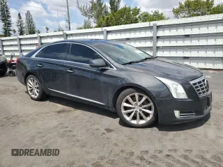 2013 Cadillac XTS Luxury with VIN 2G61R5S34D9101006, listed as a Copart auction lot 51241485 with 143,522 mi miles and Clean Title. Bid and sale history available at DreamBid. Image 4.