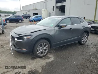 2023 Mazda CX-30 S Select с VIN 3MVDMBBM4PM514425, выставлен на аукционе Copart как лот 64205305 с пробегом 17 406 миль миль и Списание • Salvage title. История ставок и продаж доступна на DreamBid. Изображение 1.