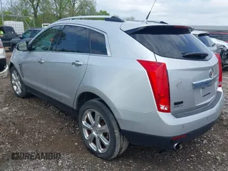 2013 Cadillac SRX Performance Collection z VIN 3GYFNDE35DS636363, wystawiony jako IAAI lot #42147483 z przebiegiem 116 894 mil mil oraz . Historia ofert i sprzedaży dostępna na DreamBid. Obrazek 3.