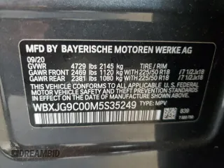 2021 BMW X1 xDrive28i with VIN WBXJG9C00M5S35249, listed as a Copart auction lot 61895775 with 34,641 mi miles and Salvage title. Bid and sale history available at DreamBid. Image 13.