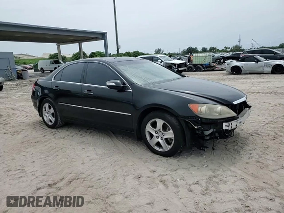 2005 Acura RL z VIN JH4KB16535C018850, wystawiony jako Copart lot #59306055 z przebiegiem 131 881 mil mil oraz Szkoda całkowita • Salvage title. Historia ofert i sprzedaży dostępna na DreamBid. Obrazek 14.