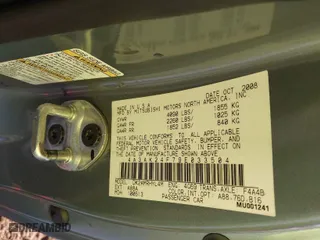 2009 Mitsubishi Eclipse GS with VIN 4A3AK24F79E033504, listed as a IAAI auction lot 41397029 with 142,935 mi miles. Bid and sale history available at carsss.com. Image 9.