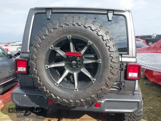 2019 Jeep Wrangler Unlimited Sahara with VIN 1C4HJXEG7KW661801, listed as a IAAI auction lot 40848731 with Not provided miles and . Bid and sale history available at DreamBid. Image 15.