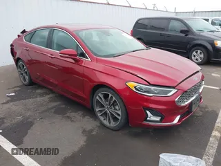 2019 Ford Fusion Titanium with VIN 3FA6P0K98KR179513, listed as a IAAI auction lot 41820059 with 112,155 mi miles. Bid and sale history available at carsss.com. Image 1.