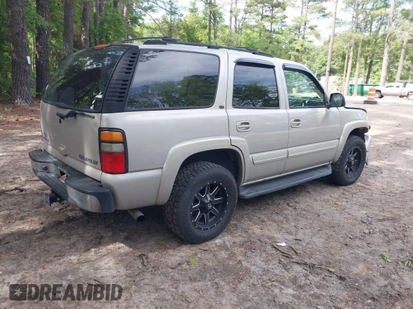 2005 Chevrolet Tahoe LS z VIN 1GNEK13T45J167997, wystawiony jako IAAI lot #42298160 z przebiegiem 142 981 mil mil oraz . Historia ofert i sprzedaży dostępna na DreamBid. Obrazek 4.