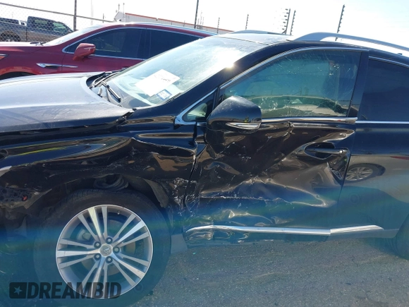 2015 Lexus RX 350 z VIN 2T2ZK1BA5FC156834, wystawiony jako IAAI lot #42379959 z przebiegiem 68 419 mil mil oraz . Historia ofert i sprzedaży dostępna na DreamBid. Obrazek 6.
