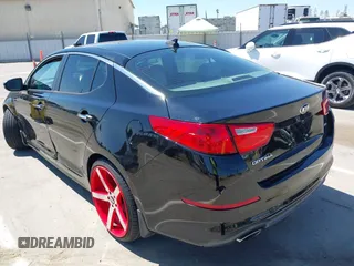 2015 Kia Optima LX z VIN 5XXGM4A76FG507580, wystawiony jako IAAI lot #42544939 z przebiegiem 99 804 mil mil oraz . Historia ofert i sprzedaży dostępna na DreamBid. Obrazek 3.