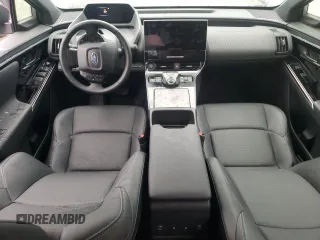 2023 Subaru Solterra Premium с VIN JTMABABA9PA015076, выставлен на аукционе Copart как лот 82706163 с пробегом 5 195 миль миль и . История ставок и продаж доступна на DreamBid. Изображение 8.