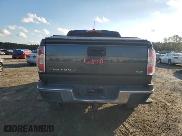 2016 GMC Canyon 2WD SLT with VIN 1GTG5DE37G1271880, listed as a Copart auction lot 79825324 with 141,748 mi miles and Salvage Title. Bid and sale history available at carsss.com. Image 6.