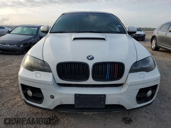 2012 BMW X6 50i z VIN 5UXFG8C59CL590549, wystawiony jako Copart lot #53071175 z przebiegiem 67 390 mil mil oraz Szkoda całkowita • Salvage title. Historia ofert i sprzedaży dostępna na DreamBid. Obrazek 5.