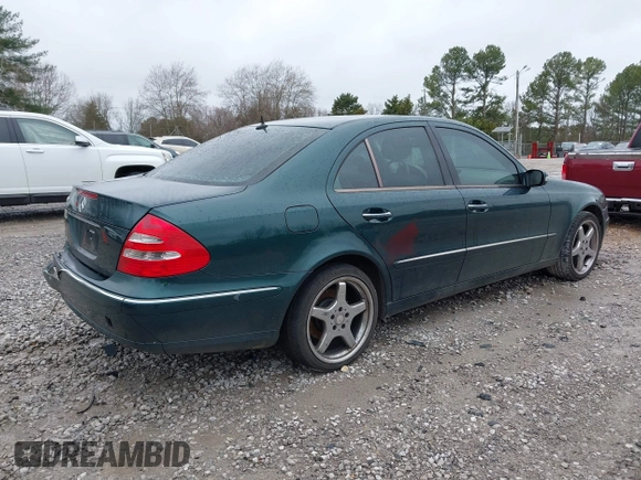 2003 Mercedes-Benz E-Class 3.2L with VIN WDBUF65J73A130214, listed as a IAAI auction lot 41731642 with 203,520 mi miles. Bid and sale history available at carsss.com. Image 4.