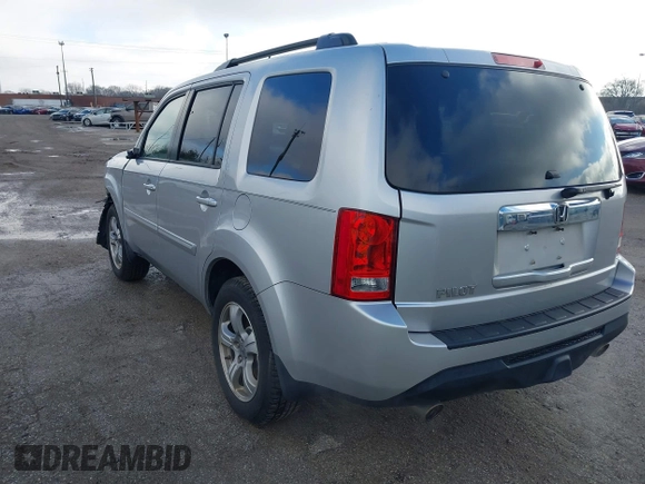 2013 Honda Pilot EX-L with VIN 5FNYF3H76DB013332, listed as a IAAI auction lot 41193240 with 121,308 mi miles and . Bid and sale history available at DreamBid. Image 3.