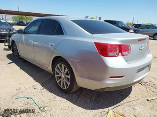 2014 Chevrolet Malibu LT with VIN 1G11E5SL5EF229717, listed as a IAAI auction lot 42018251 with 203,663 mi miles. Bid and sale history available at carsss.com. Image 3.