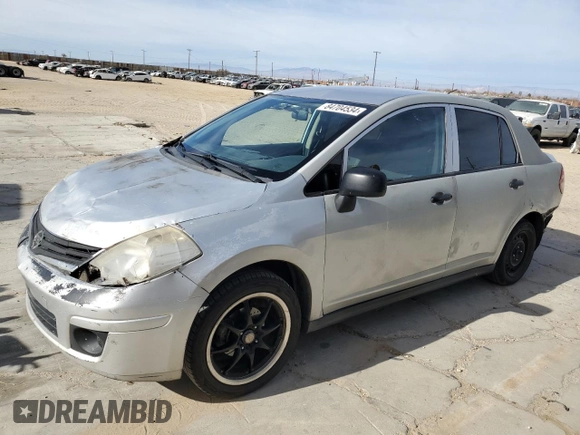 2010 Nissan Versa 1.6 with VIN 3N1CC1AP4AL372566, listed as a Copart auction lot 84704534 with 333,475 mi miles and Salvage Title. Bid and sale history available at carsss.com. Image 1.
