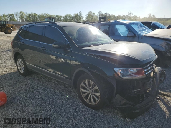 2018 Volkswagen Tiguan SEL с VIN 3VV3B7AX7JM008446, выставлен на аукционе Copart как лот 53435775 с пробегом 93 776 миль миль и Списание • Salvage title. История ставок и продаж доступна на DreamBid. Изображение 4.