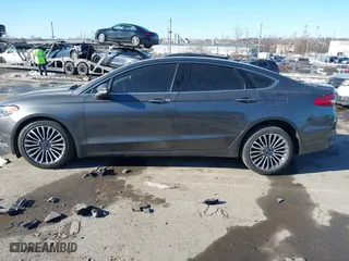 2018 Ford Fusion Titanium with VIN 3FA6P0D95JR138770, listed as a IAAI auction lot 41411388 with 107,540 mi miles. Bid and sale history available at carsss.com. Image 14.