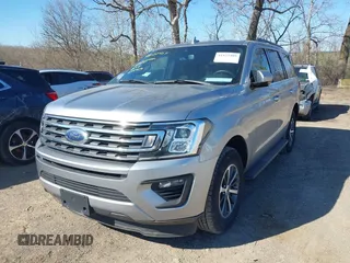 2020 Ford Expedition XLT with VIN 1FMJU1HT6LEA28613, listed as a IAAI auction lot 41822409 with 59,769 mi miles and . Bid and sale history available at DreamBid. Image 2.