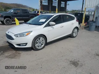 2017 Ford Focus Titanium with VIN 1FADP3N24HL331009, listed as a IAAI auction lot 42029193 with 82,068 mi miles and . Bid and sale history available at carsss.com. Image 2.