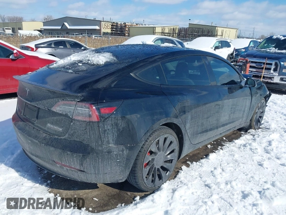 2023 Tesla Model 3 Performance with VIN 5YJ3E1EC7PF423161, listed as a IAAI auction lot 41566987 with 22,111 mi miles. Bid and sale history available at carsss.com. Image 4.