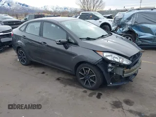 2016 Ford Fiesta SE z VIN 3FADP4BJ8GM108227, wystawiony jako IAAI lot #41243407 z przebiegiem 103 857 mil mil oraz . Historia ofert i sprzedaży dostępna na DreamBid. Obrazek 1.