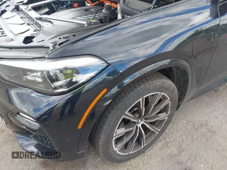 2021 BMW X5 xDrive45e with VIN 5UXTA6C09M9F27367, listed as a IAAI auction lot 42340309 with 52,881 mi miles and . Bid and sale history available at DreamBid. Image 6.