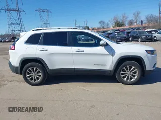 2019 Jeep Cherokee Latitude with VIN 1C4PJMCX7KD146578, listed as a IAAI auction lot 41709586 with 61,134 mi miles. Bid and sale history available at carsss.com. Image 14.