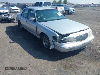 1997 Mercury Grand Marquis LS with VIN 2MELM75W2VX652942, listed as a IAAI auction lot 42000556 with 186,924 mi miles and . Bid and sale history available at DreamBid. Image 6.
