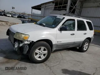 2007 Ford Escape Hybrid with VIN 1FMYU49H77KB67943, listed as a Copart auction lot 47164975 with 310,799 mi miles and Salvage Title. Bid and sale history available at carsss.com. Image 1.