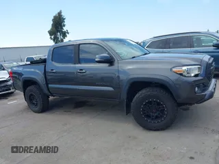 2019 Toyota Tacoma SR with VIN 3TMCZ5AN3KM207783, listed as a IAAI auction lot 42375280 with 55,784 mi miles and . Bid and sale history available at DreamBid. Image 14.