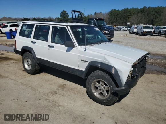 1995 Jeep Cherokee Sport with VIN 1J4FJ68S0SL646747, listed as a Copart auction lot 48772675 with 239,834 mi miles and Salvage title. Bid and sale history available at DreamBid. Image 4.