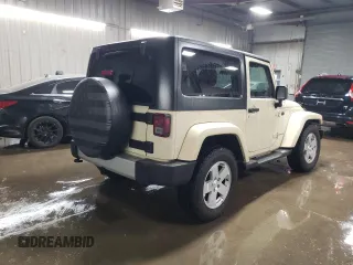 2011 Jeep Wrangler Sahara with VIN 1J4AA5D19BL577347, listed as a Copart auction lot 80340124 with 148,986 mi miles and Salvage Title. Bid and sale history available at DreamBid. Image 3.