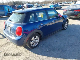 2016 MINI Hardtop 4 Door z VIN WMWXU1C54G2D09582, wystawiony jako IAAI lot #41754947 z przebiegiem 113 405 mil mil oraz . Historia ofert i sprzedaży dostępna na DreamBid. Obrazek 4.