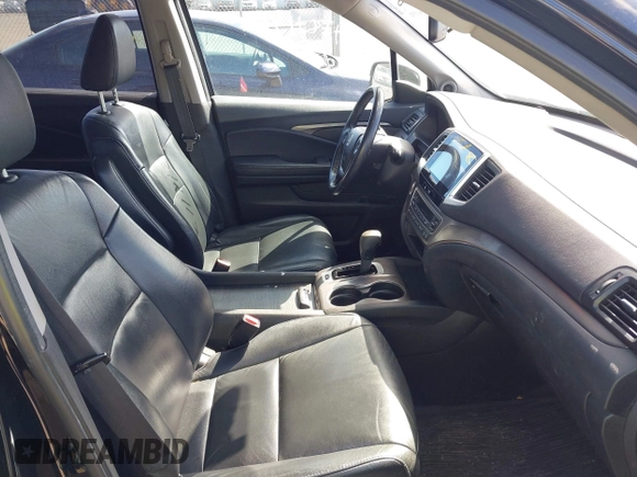 2016 Honda Pilot EX-L with VIN 5FNYF5H57GB023852, listed as a IAAI auction lot 41811412 with 151,707 mi miles and . Bid and sale history available at DreamBid. Image 5.