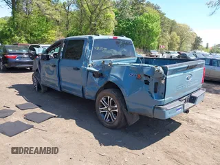 2023 Ford F-150 XL with VIN 1FTFW1E53PKD99214, listed as a IAAI auction lot 42211755 with 31 mi miles and . Bid and sale history available at DreamBid. Image 3.
