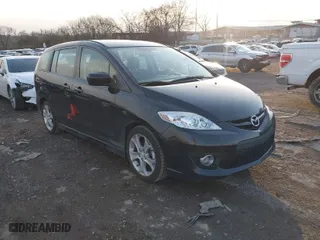 2010 Mazda Mazda5 Sport with VIN JM1CR2W3XA0385634, listed as a IAAI auction lot 41381553 with 128,726 mi miles. Bid and sale history available at carsss.com. Image 1.