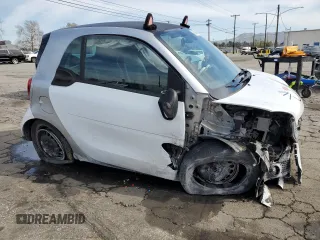 2016 Smart fortwo Passion z VIN WMEFJ5DA4GK141225, wystawiony jako Copart lot #48356965 z przebiegiem 65 928 mil mil oraz Szkody całkowita. Historia ofert i sprzedaży dostępna na DreamBid. Obrazek 4.
